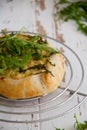 Small pie with blue cheese, pears and fresh arugula Royalty Free Stock Photo