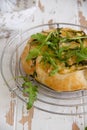 Small pie with blue cheese, pears and fresh arugula Royalty Free Stock Photo