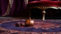 a small piece of furniture sitting on top of a purple rug next to a red chair and a red velvet ottoman on a carpeted floor