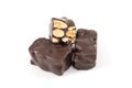 Small pieces of dark chocolate Torrone with almonds Royalty Free Stock Photo