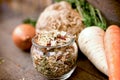 Small pieces of dried vegetables in jar , dry celery, dry ccarrot, dry persley and dry onion