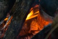 Wood pieces burning inside a traditional Indian stove