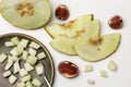 Small pieces of melon and a spoon on a plate. Sliced melon and fig halves