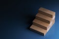 Small pieces of wood are stacked together to form a ladder Royalty Free Stock Photo