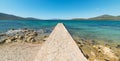 Small pier in Porto Conte bay Royalty Free Stock Photo