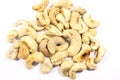 A small pile of cashews on a white background.