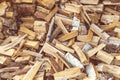A small pile of chopped birch logs. Background of Birch firewood for the oven
