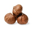 A small pile of peeled hazelnuts on a white isolated background. Side view. Close-up. Royalty Free Stock Photo