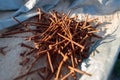 Small pile of rusty nails in the daytime Royalty Free Stock Photo