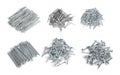 Small piles of different metal nails. Royalty Free Stock Photo