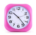 Small pink alarm clock isolated on white background Royalty Free Stock Photo