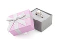 Small pink and gray jewelry gift box with bow isolated on white Royalty Free Stock Photo