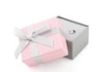 Small pink and gray jewelry gift boxes with bow isolated on whit Royalty Free Stock Photo