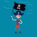 A small pirate in a hat with a black flag in his hands Royalty Free Stock Photo