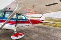 Small plane on aiport field. CESNA Blue white Red Royalty Free Stock Photo