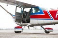 Small plane on aiport field. CESNA Blue white Red Royalty Free Stock Photo