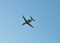 small plane flying low in the sky with space for text Royalty Free Stock Photo