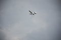 Small plane flying in sky with Stormy Clouds Royalty Free Stock Photo