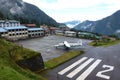 Small plane landing at the Tenzing-Hillary Airport in Lukla, Everest Base Camp trek, Nepal