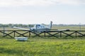 Small plane parked at airfield Royalty Free Stock Photo