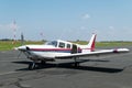 Small plane parked on the runway Royalty Free Stock Photo