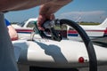 The small plane refueling Royalty Free Stock Photo