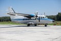 Small plane on runway takes off Royalty Free Stock Photo