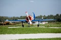 Small plane on runway takes off Royalty Free Stock Photo