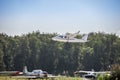 Small plane on runway takes off Royalty Free Stock Photo