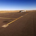 Small plane on tarmac at airport.