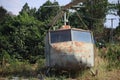 Small planes, old helicopters, rusted, abandoned, outdoors