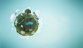 Small planet on a simple green background Royalty Free Stock Photo