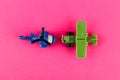 Small plastic airplane and helicopter with copy space on pink background Royalty Free Stock Photo
