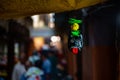 Small plastic Nimbu Mirchi trinket hanging on the blurred background in Varanasi