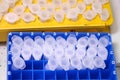 Small plastic test tubes in a rack. Microbiology of chemical analysis. Research and development scientific work at the