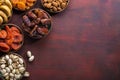 Small plates with dried fruits date palm fruits, dried apricots, figs and nuts pistachios, almonds for Iftar in Ramadan on the