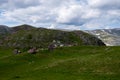 A small plowed field on a farm. Beautiful old mountain village Royalty Free Stock Photo