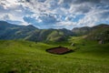 A small plowed field on a farm. Beautiful old mountain village Royalty Free Stock Photo