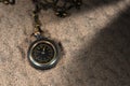 Small Pocket Watch over the Sand Royalty Free Stock Photo