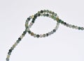 Small polished green moss agate beads