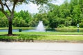 A small pond and geyser in a Florida community Royalty Free Stock Photo