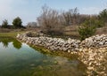 Small ponds watering place for sheep in spring near Lubenice Royalty Free Stock Photo