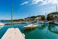 Small port of Lake Garda with moored boats - Village of Lazise Veneto Italy Royalty Free Stock Photo