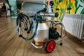 Small portable compact milking machine for milking one cow