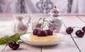 Small portion chessecake decorated with sweet cherries Royalty Free Stock Photo