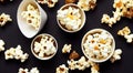 Small portions of caramel popcorn in small bowls on table.