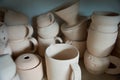 Small pottery items stand on a shelf Royalty Free Stock Photo