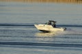 Small powerboat morning light