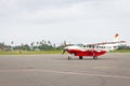 Small private airplane in the airport. Aeroplane with propeller. Travel destinations concept. Aviation transport.