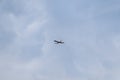 Small private flying airplane yet flying in the sky with cloudy weather